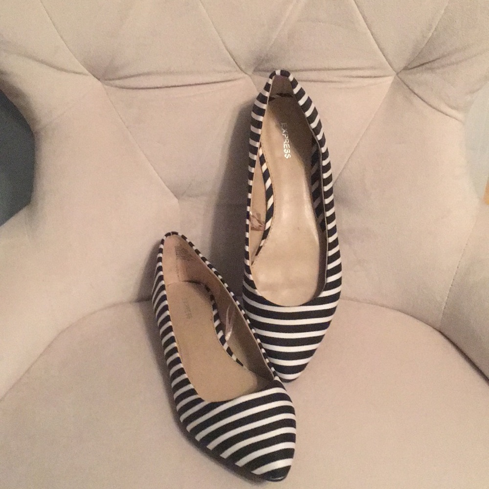 Express black and white stripped flats.
